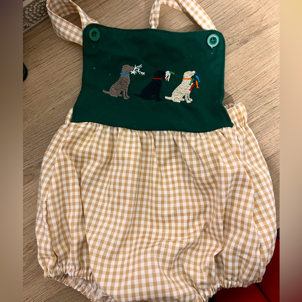 Bubble romper for boy or girl with embroidered bird dogs.